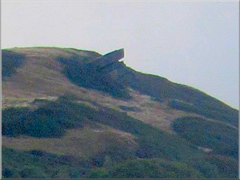 The Hanging Stone on top of the hill across the valley